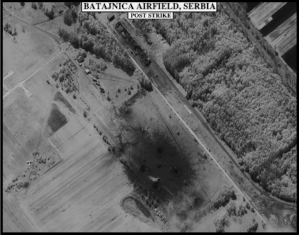 Post-strike bomb damage assessment photograph of the Batajnica airfield, Serbia, used by Joint Staff Vice Director for Strategic Plans and Policy Maj. Gen. Charles F. Wald, U.S. Air Force, during a press briefing on NATO Operation Allied Force in the Pentagon on May 1, 1999. (Released)