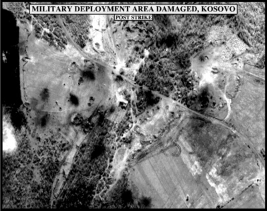 Post-strike bomb damage assessment photograph of Military Deployment Area Damaged, Kosovo, used by Joint Staff Vice Director for Strategic Plans and Policy Maj. Gen. Charles F. Wald, U.S. Air Force, during a press briefing on NATO Operation Allied Force in the Pentagon on May 5, 1999. 