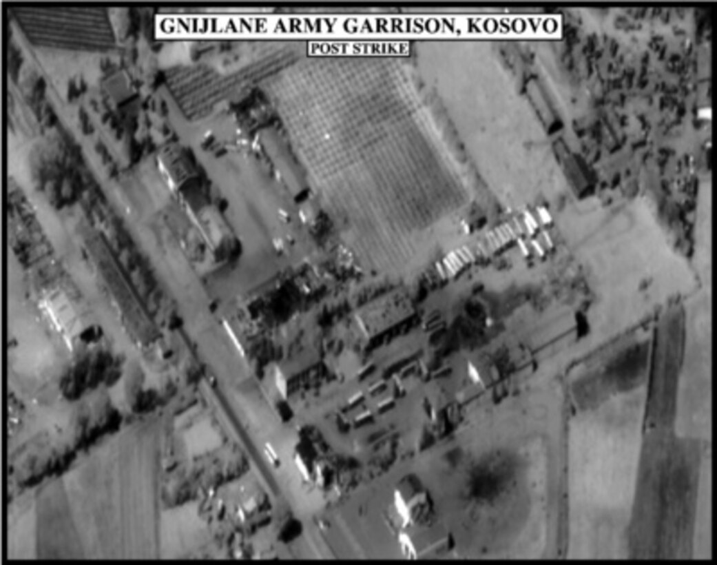 Post-strike bomb damage assessment photograph of the Gnijlane Army Garrison, Kosovo, used by Joint Staff Vice Director for Strategic Plans and Policy Maj. Gen. Charles F. Wald, U.S. Air Force, during a press briefing on NATO Operation Allied Force in the Pentagon on May 6, 1999. 