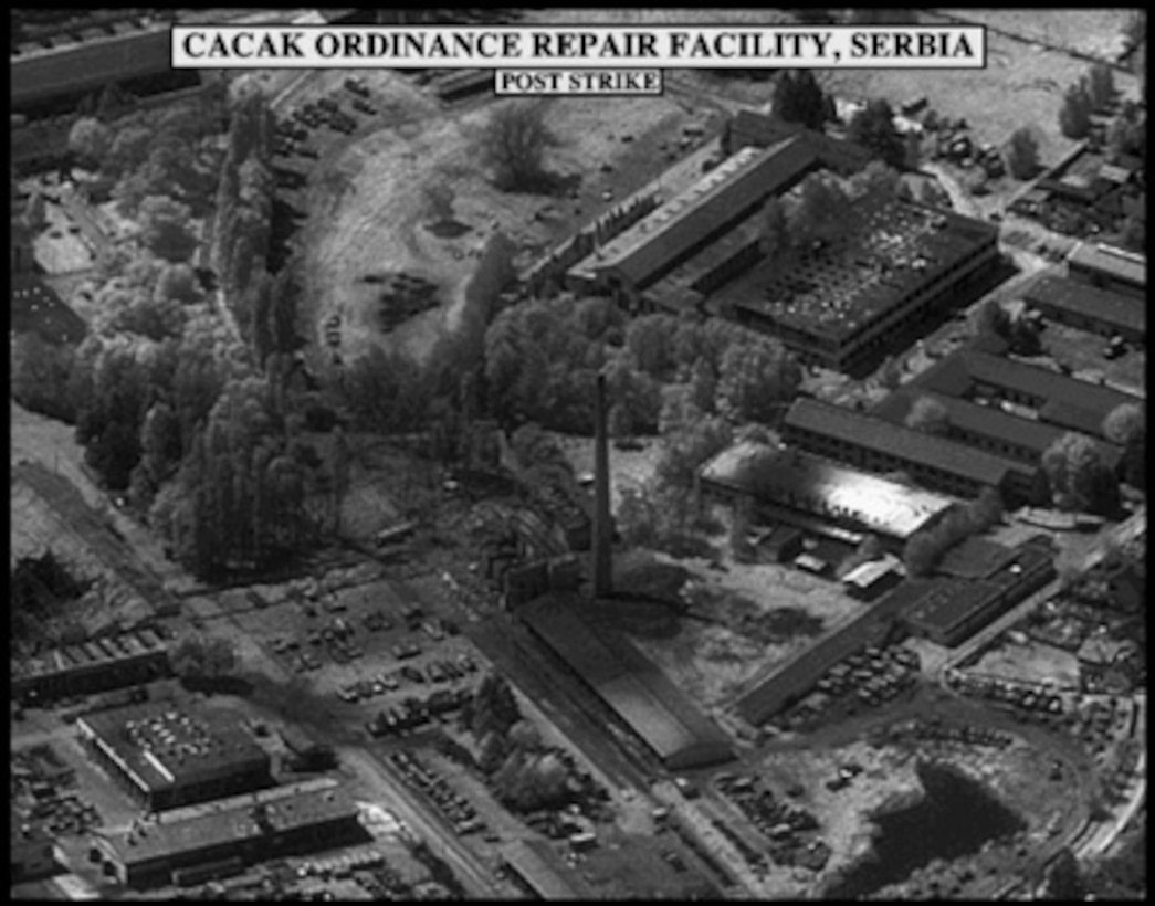 Post-strike bomb damage assessment photograph of the Cacak Ordnance Repair Facility, Serbia, used by Joint Staff Vice Director for Strategic Plans and Policy Maj. Gen. Charles F. Wald, U.S. Air Force, during a press briefing on NATO Operation Allied Force in the Pentagon on May 13, 1999. 