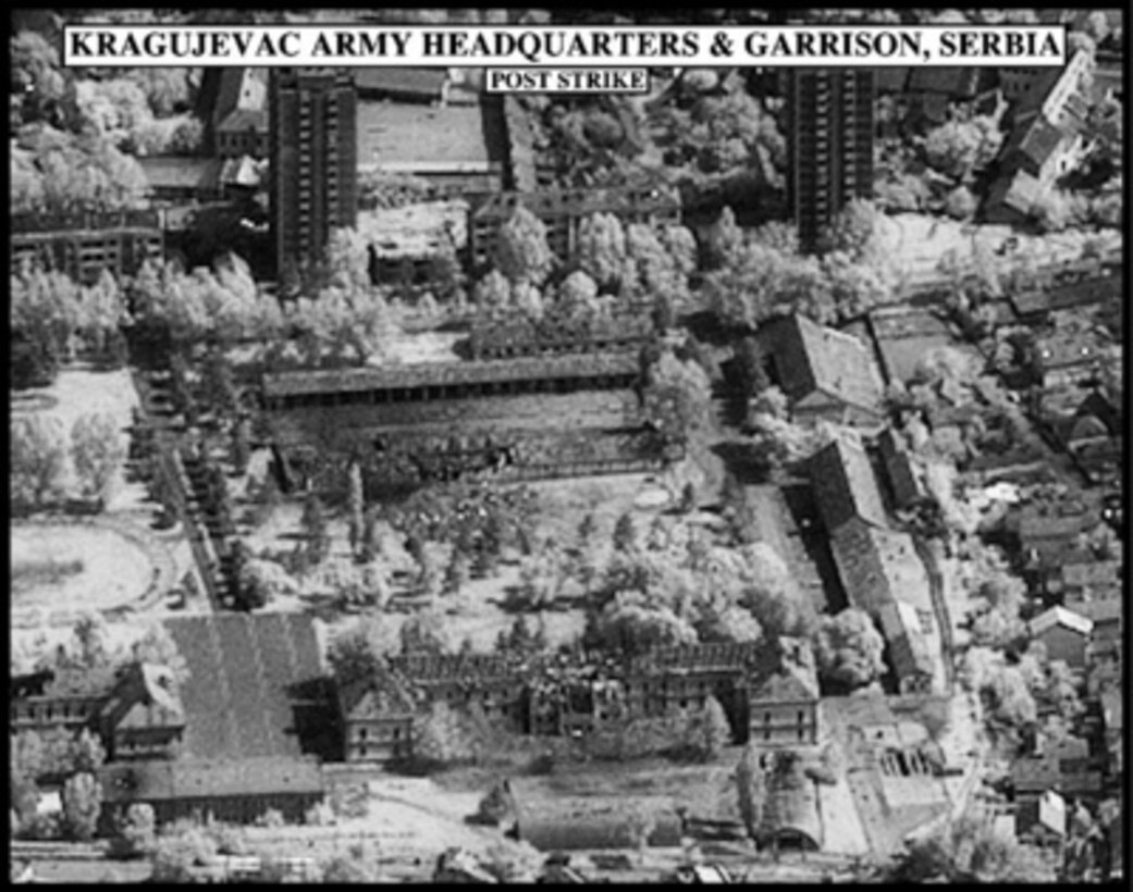 Post-strike bomb damage assessment photograph of the Kragujevac Army Headquarters and Garrison, Serbia, used by Joint Staff Vice Director for Strategic Plans and Policy Maj. Gen. Charles F. Wald, U.S. Air Force, during a press briefing on NATO Operation Allied Force in the Pentagon on May 13, 1999. 