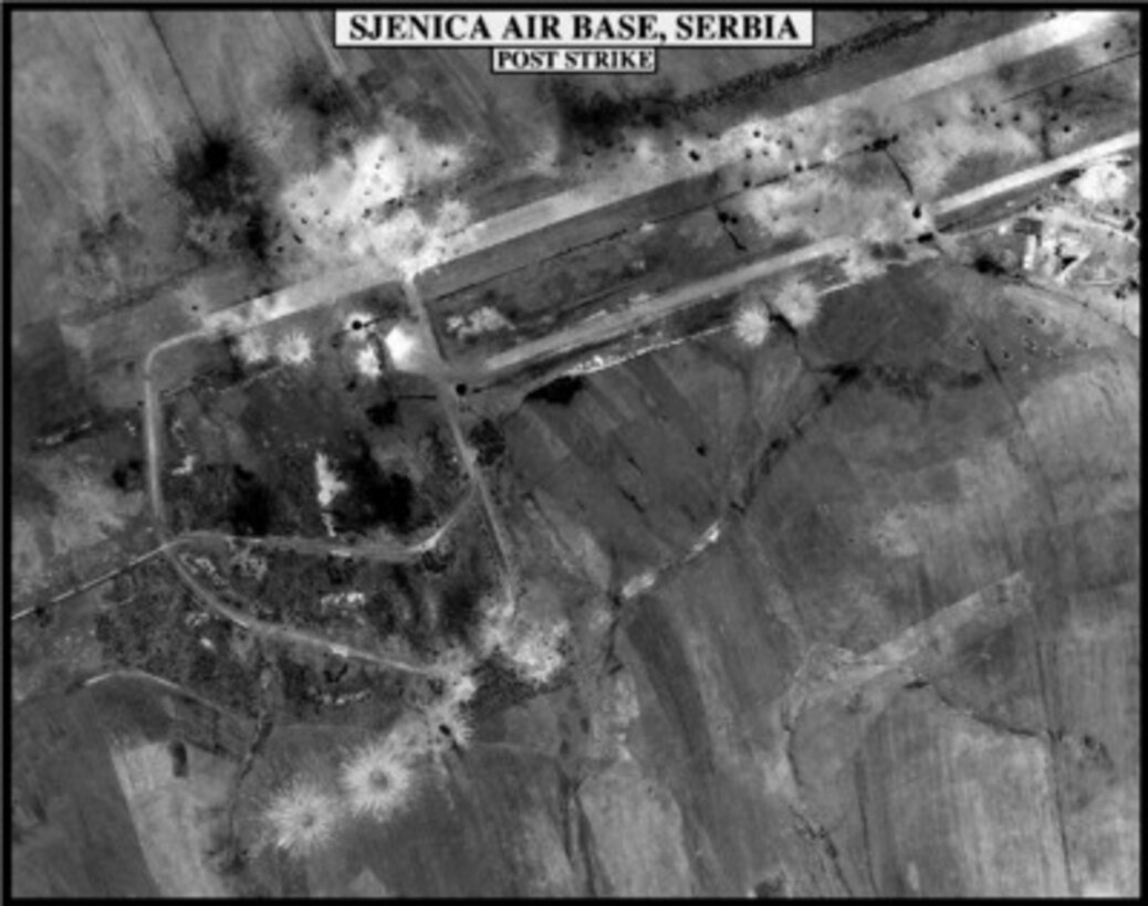 Post-strike bomb damage assessment photograph of the Sjenica Air Base, Serbia, used by Joint Staff Vice Director for Strategic Plans and Policy Maj. Gen. Charles F. Wald, U.S. Air Force, during a press briefing on NATO Operation Allied Force in the Pentagon on May 17, 1999. 