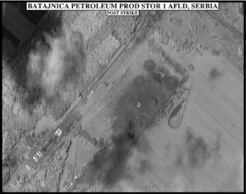 Post-strike bomb damage assessment photograph of the Batajnica Airfield Petroleum Product Storage, Serbia, used by Joint Staff Vice Director for Strategic Plans and Policy Maj. Gen. Charles F. Wald, U.S. Air Force, during a press briefing on NATO Operation Allied Force in the Pentagon on May 18, 1999. 