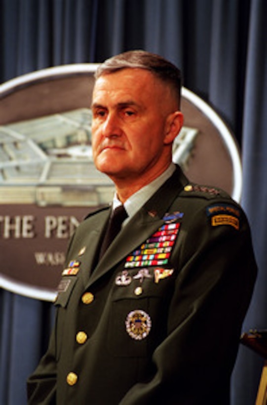 Chairman of the Joint Chiefs of Staff Gen. Henry H. Shelton, U.S. Army, listens to a reporter's question during a Pentagon press briefing on NATO Operation Allied Force, on May 12, 1999. 