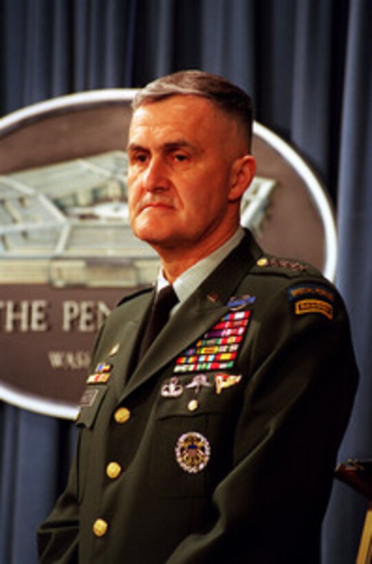 Chairman of the Joint Chiefs of Staff Gen. Henry H. Shelton, U.S. Army, listens to a reporter's question during a Pentagon press briefing on NATO Operation Allied Force, on May 12, 1999. 