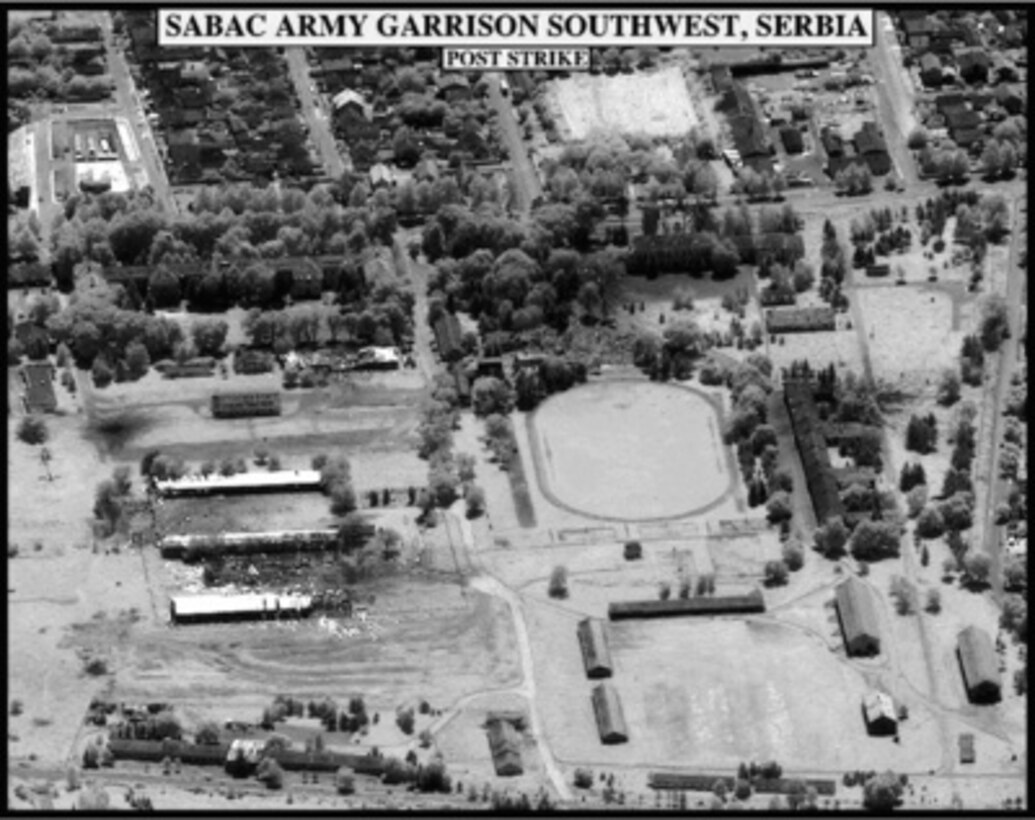 Post-strike bomb damage assessment photograph of the Sabac Army Garrison Southwest, Serbia, used by Joint Staff Vice Director for Strategic Plans and Policy Maj. Gen. Charles F. Wald, U.S. Air Force, during a press briefing on NATO Operation Allied Force in the Pentagon on May 24, 1999. 
