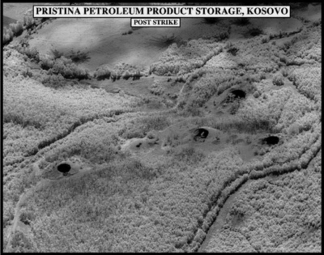 Post-strike bomb damage assessment photograph of the Pristina Petroleum Product Storage, Kosovo, used by Joint Staff Vice Director for Strategic Plans and Policy Maj. Gen. Charles F. Wald, U.S. Air Force, during a press briefing on NATO Operation Allied Force in the Pentagon on May 24, 1999. 