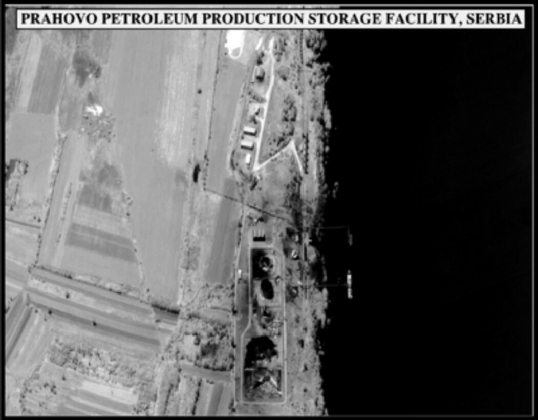 Post-strike bomb damage assessment photograph of the Prahovo Petroleum Production Storage Facility, Serbia, used by Joint Staff Vice Director for Strategic Plans and Policy Maj. Gen. Charles F. Wald, U.S. Air Force, during a press briefing on NATO Operation Allied Force in the Pentagon on May 26, 1999. 