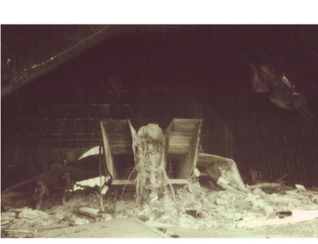 Post Operation Desert Storm assessment photograph of an Iraqi aircraft bunker with the remains of a MIG-25 Foxbat after being attacked with a 2,000 pound laser guided bomb. This photograph was shown by Maj. Gen. Charles F. Wald, U.S. Air Force, during a press briefing on NATO Operation Allied Force in the Pentagon on May 28, 1999. 