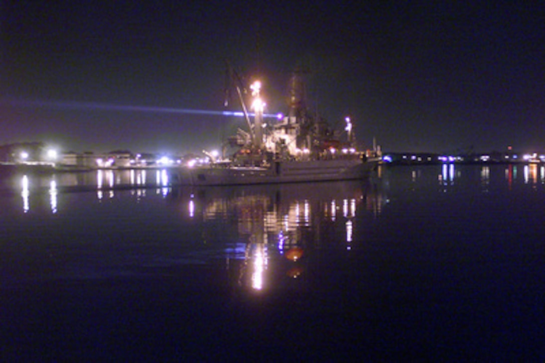 The USS Grapple (ARS 53) departs from its home port of Naval Amphibious Base Little Creek, Va., on Oct. 31, 1999, on the way to assist in recovery efforts following the crash of EgyptAir Flight 990 off the coast of Nantucket, Mass. The auxiliary rescue salvage ship was involved in the search and recovery of TWA Flight 800. 