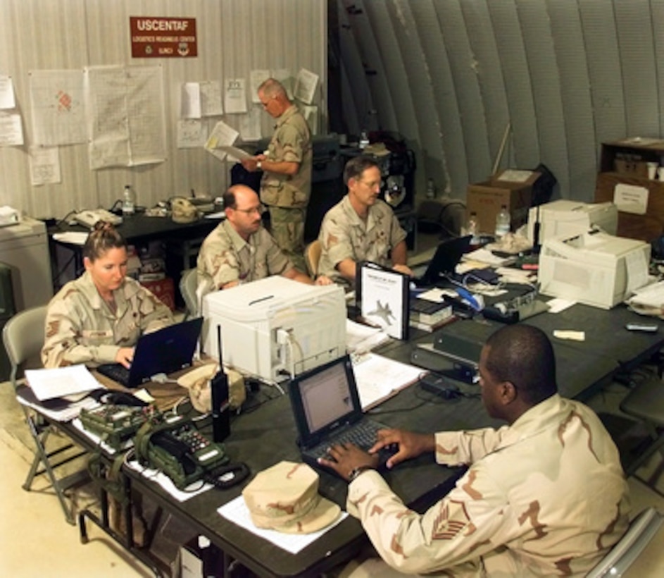 U.S. Air Force personnel work in the U.S. Central Air Force's Logistics Readiness Center established at Cairo West Air Base, Egypt, on Oct. 1, 1999, during Exercise Bright Star '99/00. Bright Star is a joint/combined command post and tactical field exercise in Egypt involving over 50,000 participants from 11 countries. The annual exercise is designed to improve readiness and interoperability between U.S., Egyptian and coalition forces. These personnel, deployed from Shaw Air Force Base, S.C. and Robins Air Force Base, Ga., are responsible for all Harvest Falcon assets, supply, re-supply, and local area purchase needs for Bright Star 99/00. 