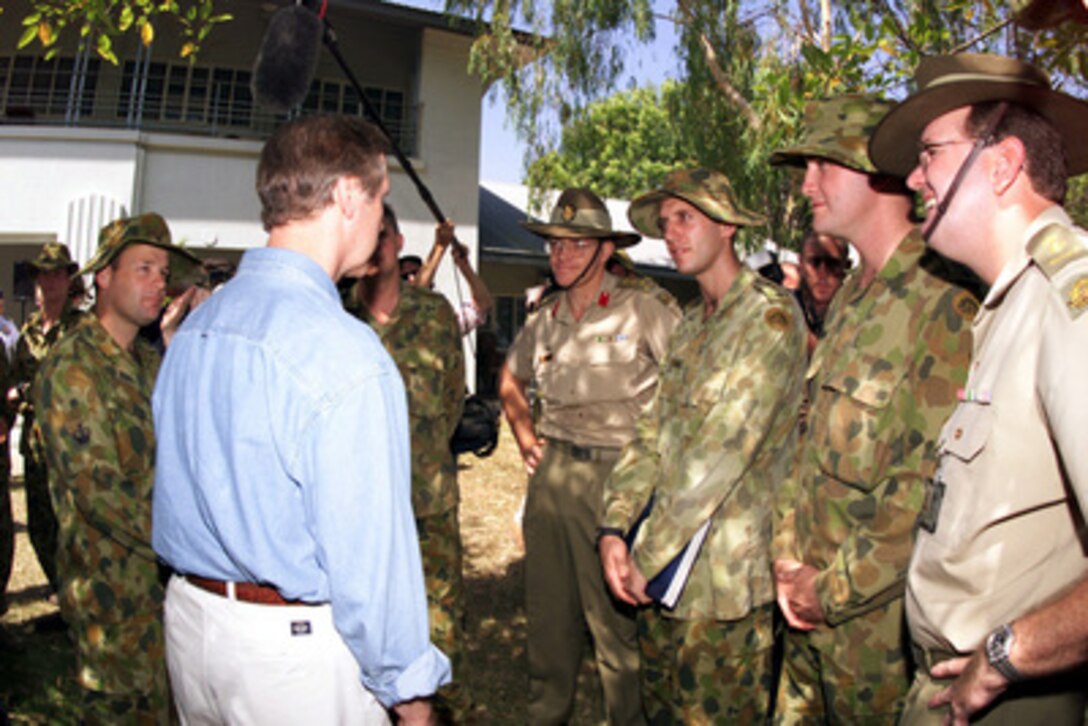 Secretary of Defense William S. Cohen (left) meets members of the Australian military in Darwin, Australia, on Sept. 29, 1999, as they prepare to deploy as part of the multinational peacekeeping forces in East Timor, Indonesia. Cohen is in Darwin to meet with his counterparts and members of the peacekeeping force which includes personnel from the U.S. Army, Marines and Air Force. 
