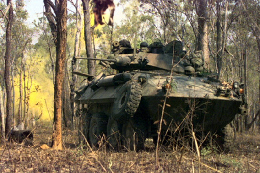 U.S. Marines from 3rd Light Armored Reconnaissance Company train the turret of their Light Armored Vehicle toward targets at the Shoalwater Bay Area Training Area in Queensland, Australia, on Oct. 11, 1999. The Marines are taking part in Exercise Crocodile '99, a combined U.S. and Australian military training exercise being conducted at the Shoalwater Bay Training Area. 
