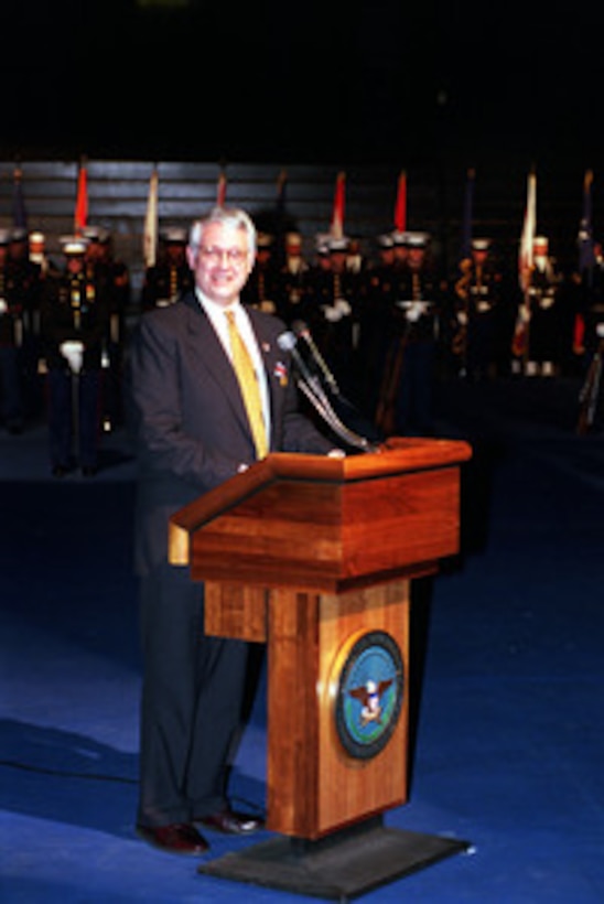 Deputy Secretary of Defense John J. Hamre makes his departing remarks during an armed forces review and award ceremony in his honor at Conmy Hall, Fort Myer, Va., on March 30, 2000. Secretary of Defense William S. Cohen presented Hamre with the Department of Defense Distinguished Public Service Medal during the ceremony. Hamre has served as the 26th Deputy Secretary of Defense since July 29, 1997. 
