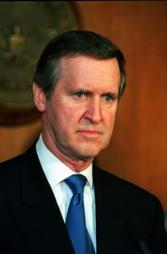 Following a meeting with Minister of Defense Oleksandr Kuzmuk of Ukraine, Secretary of Defense William S. Cohen listens to a reporter's question during a joint press briefing at the Pentagon on March 31, 2000. 