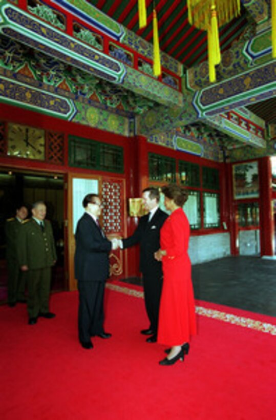 President Jiang Zemin (second from left) greets Secretary of Defense and Mrs. William S. Cohen at Zhongnanhai in Beijing, China, on July 13, 2000. Cohen is visiting Beijing, Shanghai and Sydney, Australia as part of a seven day trip to the Western Pacific. 