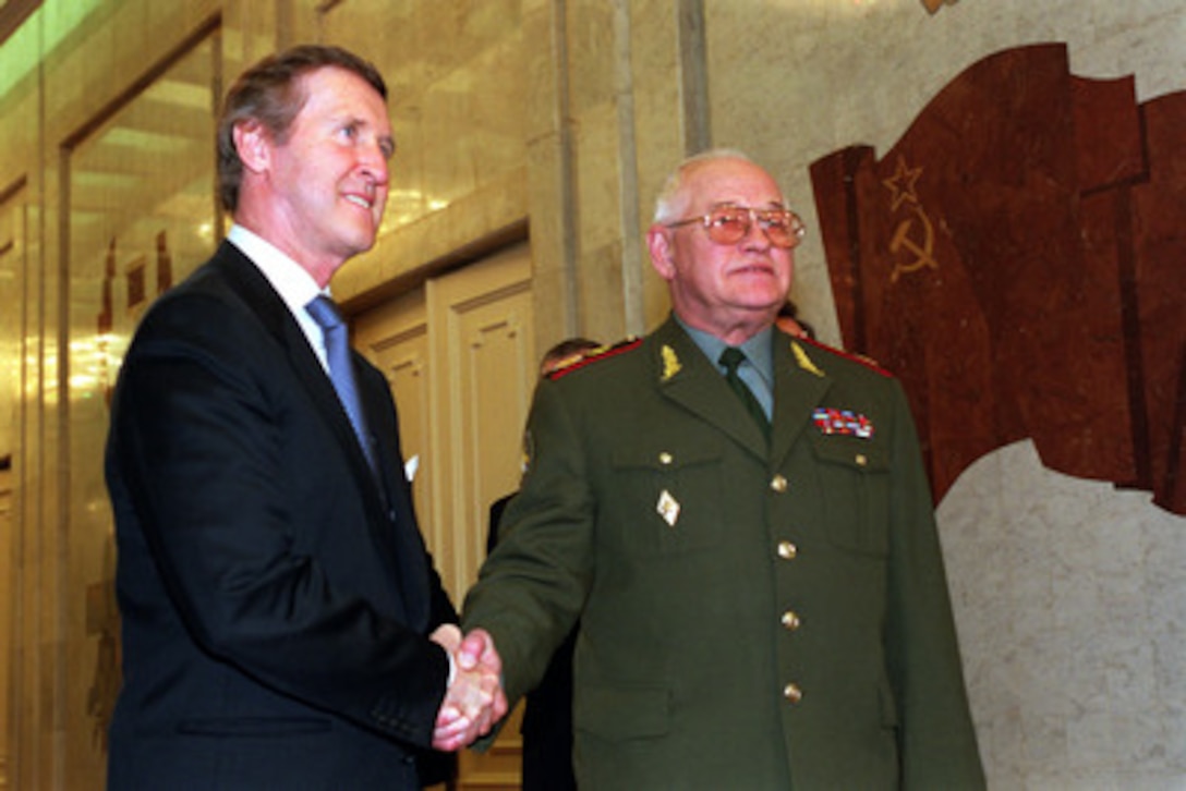Secretary of Defense William S. Cohen (left) is greeted by Russian Defense Minister Marshal Igor Dmitriyevich Sergeyev as he arrives at the Ministry of Defense building in Moscow, Russia, on June 13, 2000. Cohen and Sergeyev will meet to discuss a range of security issues including U.S. plans for developing an effective defense against a limited ballistic missile attack. Cohen is in Moscow during a seven-day European trip to meet with government officials and defense leaders. 