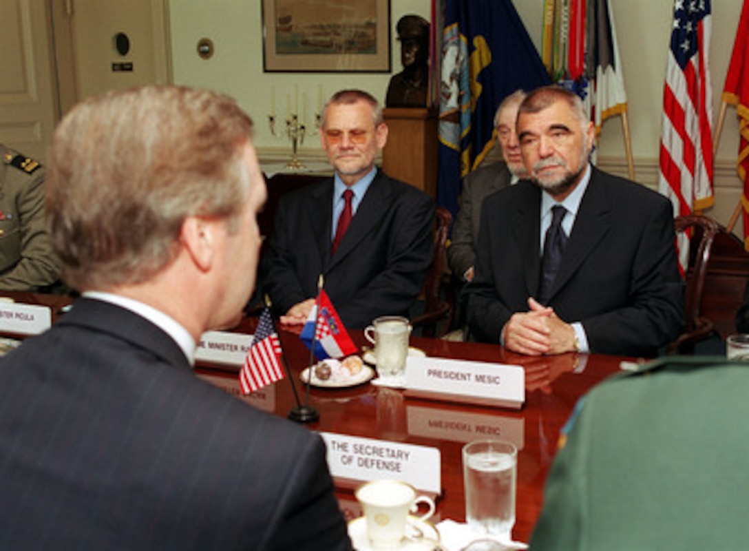 Secretary of Defense William S. Cohen (left foreground) meets with Prime Minister Ivica Racan (left) and President Stjepan Mesic (right) of the Republic of Croatia, in the Pentagon on Aug. 8, 2000. Cohen, Mesic and Racan are meeting to discuss general regional security issues of interest to both nations. 
