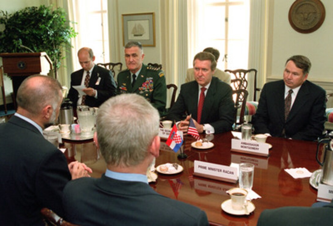 Secretary of Defense William S. Cohen (2nd from right) meets with Croatian President Stjepan Mesic (left foreground) and Prime Minister Ivica Racan (right foreground) in the Pentagon on Aug. 8, 2000. Also participating on the U.S. side are Principal Deputy Under Secretary of Defense (Policy) James Bodner (far left), Chairman of the Joint Chiefs of Staff Gen. Henry H. Shelton (2nd from left), U.S. Army, and U.S. Ambassador to Croatia William D. Montgomery (right). 