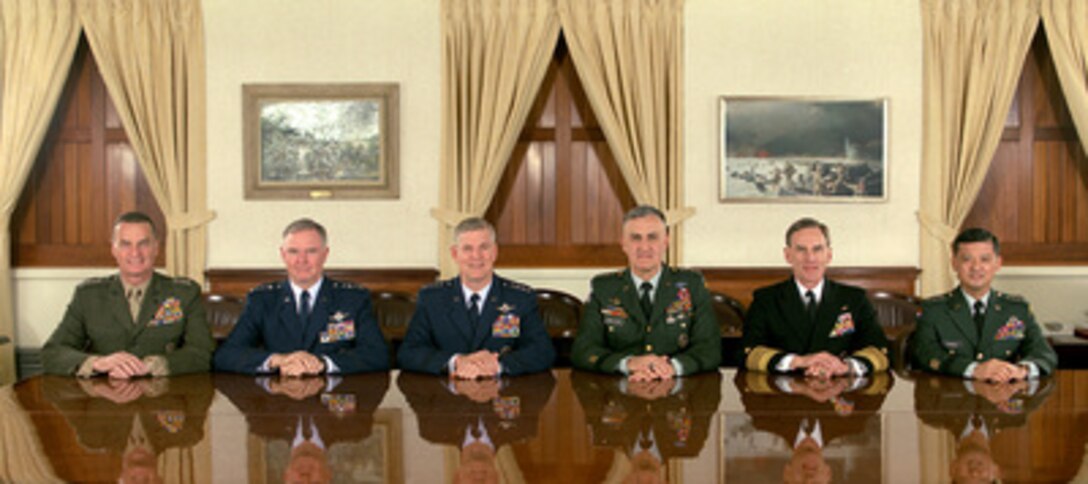 The Joint Chiefs of Staff photographed in the Joint Chiefs of Staff Gold Room, more commonly known as The Tank, in the Pentagon on April 6, 2000. From left to right are: U.S. Marine Corps Commandant Gen. James L. Jones Jr., U.S. Air Force Chief of Staff Gen. Michael E. Ryan, Vice Chairman of the Joint Chiefs of Staff Gen. Richard B. Myers, U.S. Air Force, Chairman of the Joint Chiefs of Staff Gen. Henry H. Shelton, U.S. Army, U.S. Navy Chief of Naval Operations Adm. Jay L. Johnson, and U.S. Army Chief of Staff Gen. Eric K. Shinseki. 