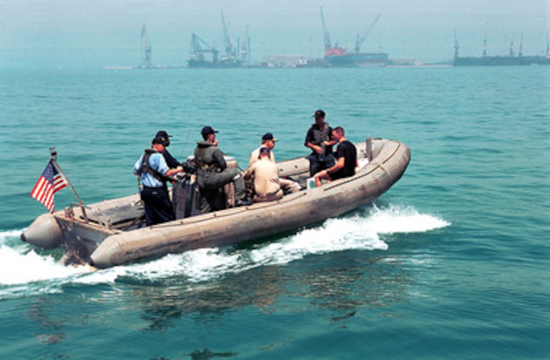 Sailors from the aircraft carrier USS George Washington (CVN 73) leave the ship in a Rigid Hull Inflatable Boat on Aug. 24, 2000, to assist in the recovery of Gulf Air Flight 072, which crashed into the Persian Gulf off the northern coast of Bahrain yesterday. The George Washington, home ported in Norfolk, Va., is in Bahrain on a routine port visit to the gulf island nation. The George Washington Battle Group is deployed to the Persian Gulf in support of Operation Southern Watch, which is the U.S. and coalition enforcement of the no-fly-zone over Southern Iraq. 