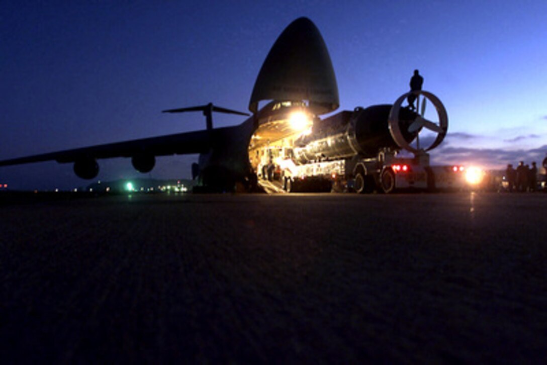 The U.S. Navy's Deep Submergence Rescue Vehicle Mystic (DSRV 1) is loaded aboard a U.S. Air Force Reserve C-5A Galaxy aircraft at Naval Air Station North Island in San Diego, Calif., on Aug. 22, 2000. The Mystic is being transported to Europe to take part in Exercise Sorbet Royal 2000, a NATO submarine rescue exercise off the Mediterranean coast of Turkey. 