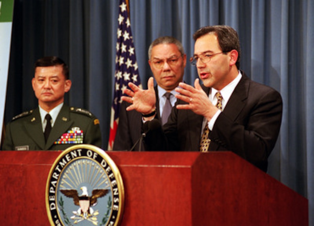 Secretary of the Army Louis Caldera unveils two new recruiting initiatives involving education options at a Pentagon press conference on Feb. 3, 2000. The programs are called College First and GED Plus, the Army's high school completion program. Joining Caldera on stage and adding their support to the innovative programs are Gen. Eric K. Shinseki (left), chief of staff of the Army, and retired Army Gen. Colin Powell (center), former chairman of the Joint Chiefs of Staff and current chairman of America's Promise. Secretary of Education Richard Riley and Sergeant Major of the Army Robert Hall also joined Caldera at the conference. 