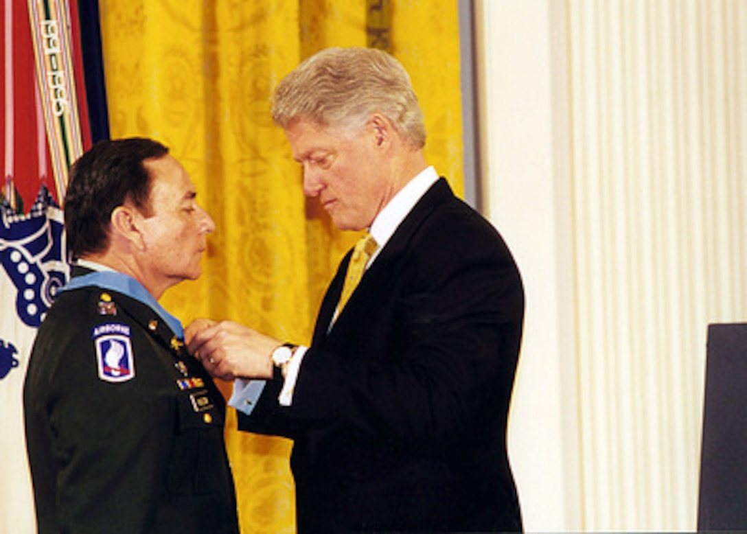 President Bill Clinton awards the Medal of Honor to Alfred Rascon in a White House ceremony on Feb. 8, 2000. Rascon received the award for gallant and selfless actions during an intense enemy attack in the Long Khanh Province of Vietnam in March 1966. At the time, Rascon was a 20-year-old specialist serving as a medic with the Reconnaissance Platoon, Headquarters Company, 1st Battalion, 503rd Airborne Infantry, 173rd Airborne Brigade (Separate). 