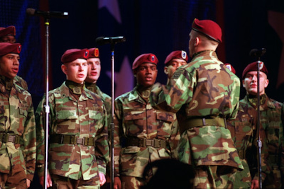 Singing paratroopers from the U.S. Army's 82nd Airborne Division, Fort. Bragg, N.C., perform at the Pentagon Pops in Washington, D.C., on Feb. 21, 2000. Secretary of Defense William S. Cohen and his wife are hosting the Pentagon Pops, a musical salute with the theme of The Hero of the Century--the American G.I., at the Daughters of the American Revolution Constitution Hall. 