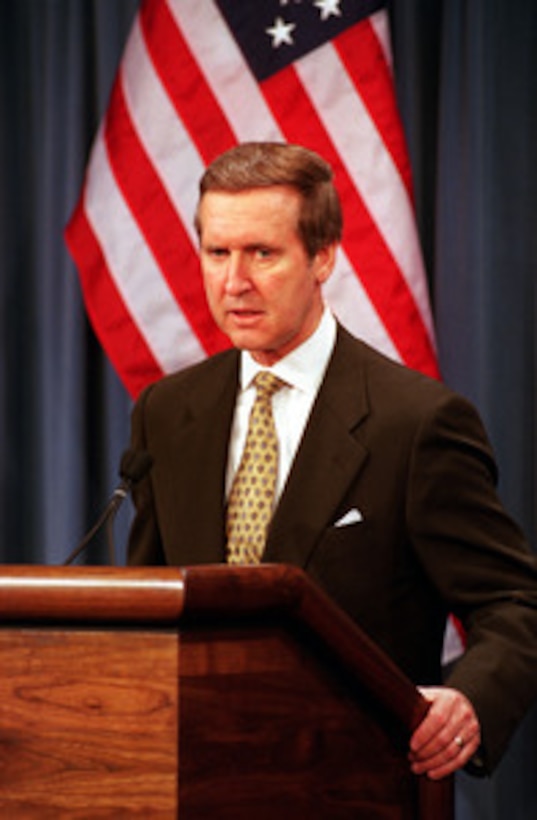 Secretary of Defense William S. Cohen responds to a reporter's question during a joint press briefing with French Minister of Defense Alain Richard in the Pentagon on Feb. 23, 2000. 