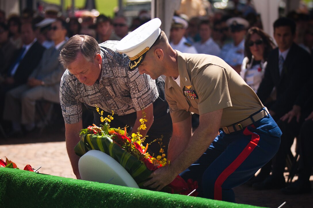 Craig B. Whelden, executive director for U.S. Marine Corps Forces, Pacific, and Col. Jay T. Arnett, deputy chief of staff, MarForPac, lay a wreath in remembrance of all Australia-New Zealand Army Corps soldiers who have given their lives, past and present, at the 40th Annual ANZAC Day ceremony at the National Memorial Cemetery of the Pacific, Punchbowl in Honolulu, April 25. ANZAC day has been observed globally since 1916, the year after nearly 11,000 ANZAC soldiers lost their lives in the Battle of Gallipoli.