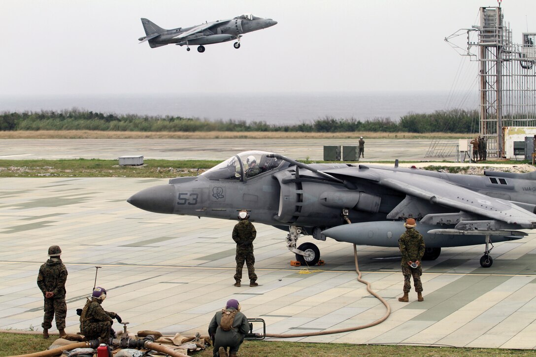 Marines with Marine Wing Support Squadron 172 refuel an AV-8B Harrier jet during a forward arming and refueling point operation at Ie Shima Training Range Feb. 28. The Harriers, part of Marine Attack Squadron 311, from Marine Corps Air Station Miramar, Calif., are currently assigned to 1st Marine Aircraft Wing, III Marine Expeditionary Force, through the Marine Corps’ unit deployment program. MWSS-172 is part of Marine Wing Support Group 17, 1st MAW, III MEF.