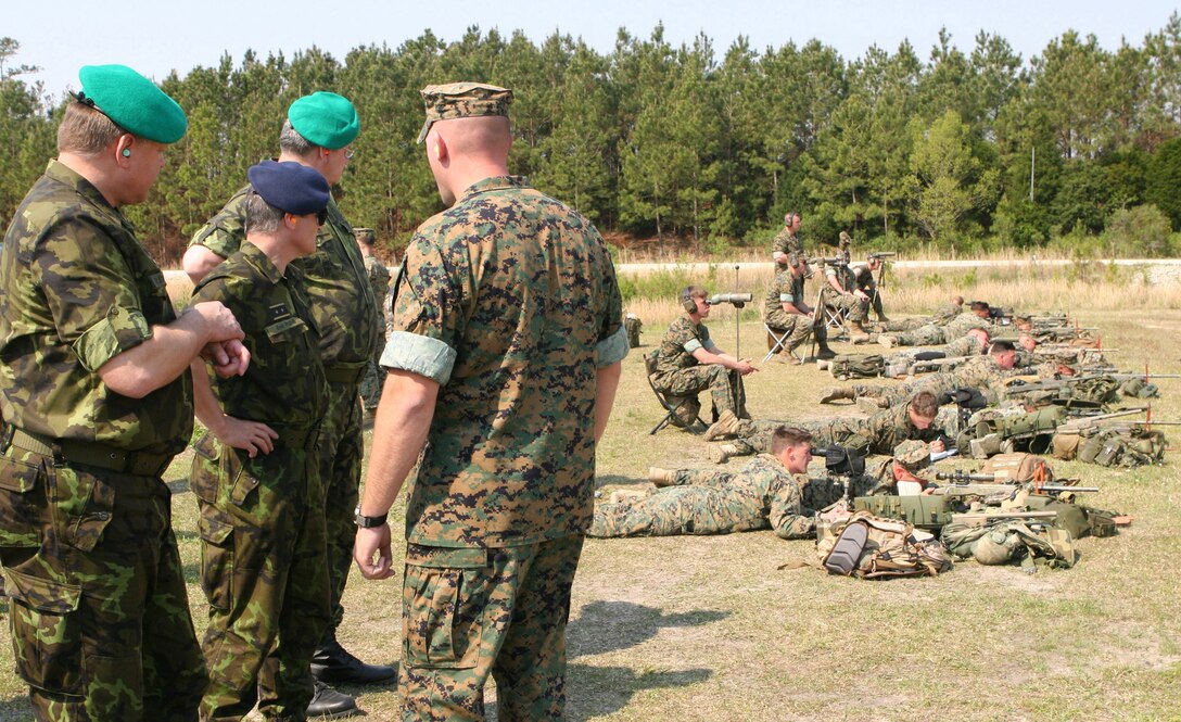MARINE CORPS BASE CAMP LEJEUNE, N.C. - (pictured at far left) The top military officer for the Czech Republic's military, Lt. Gen. Pavel Stefka, chief of general staff of the armed forces, watches with fellow officers the training given to Marines by the base's scout sniper school April 20.  Stefka and a delegation of top Czech officers viewed training and capabilities of II Marine Expeditionary Force with Lt. Gen. James Amos, commanding general II MEF, during a recent visit to the United States.  The Czech Republic's military forces have deployed in support of the U.S. and allied operations in Afghanistan, the Balkans and Iraq during the past decade.  (Official U.S. Marine Corps photo by Cpl. Ruben D. Maestre)