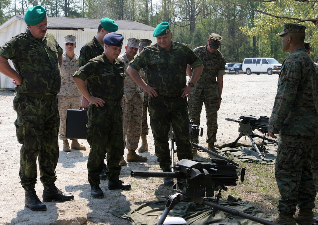 MARINE CORPS BASE CAMP LEJEUNE, N.C. - Top military officers from the armed forces of the Czech Republic view MK-19 grenade launchers on display during a Marine combat training operation April 20.  The delegation of top Czech officers viewed training and capabilities of II Marine Expeditionary Force with Lt. Gen. James Amos, commanding general II MEF, during a recent visit to the United States.  The Czech Republic's military forces have deployed in support of the U.S. and allied operations in Afghanistan, the Balkans and Iraq during the past decade.  (Official U.S. Marine Corps photo by Cpl. Ruben D. Maestre)