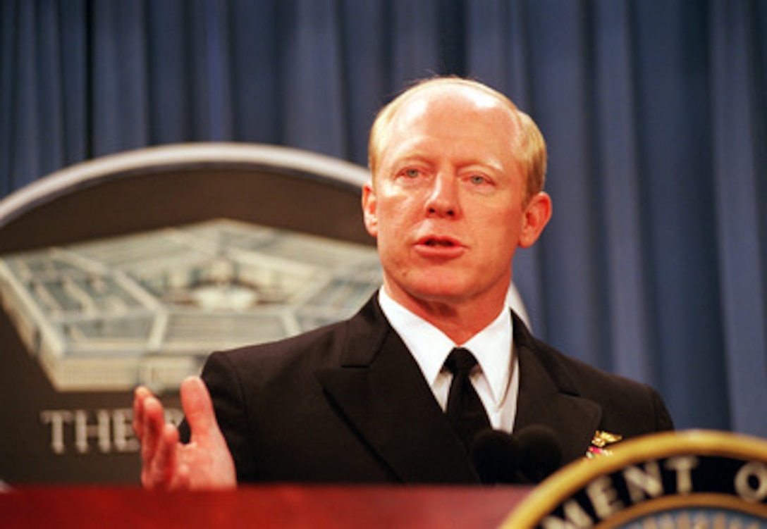 Rear Adm. Robert F. Willard, U.S. Navy, Joint Chiefs of Staff Y2K Task Force, answers a reporter's question about the effects of the Y2K rollover in the Defense Department at a noon Pentagon press conference on Jan. 1, 2000. 