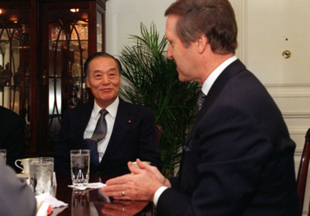 Director General Tsutomu Kawara (left), of the Japan Defense Agency, meets with Secretary of Defense William S. Cohen (right) in his Pentagon office on Jan. 5, 2000. The two men were joined in the meeting by Under Secretary of Defense for Policy Walter Slocombe, Ambassador Thomas Foley of the U.S. and Ambassador Shunji Yanai of Japan in discussing a range of regional and global security issues. 