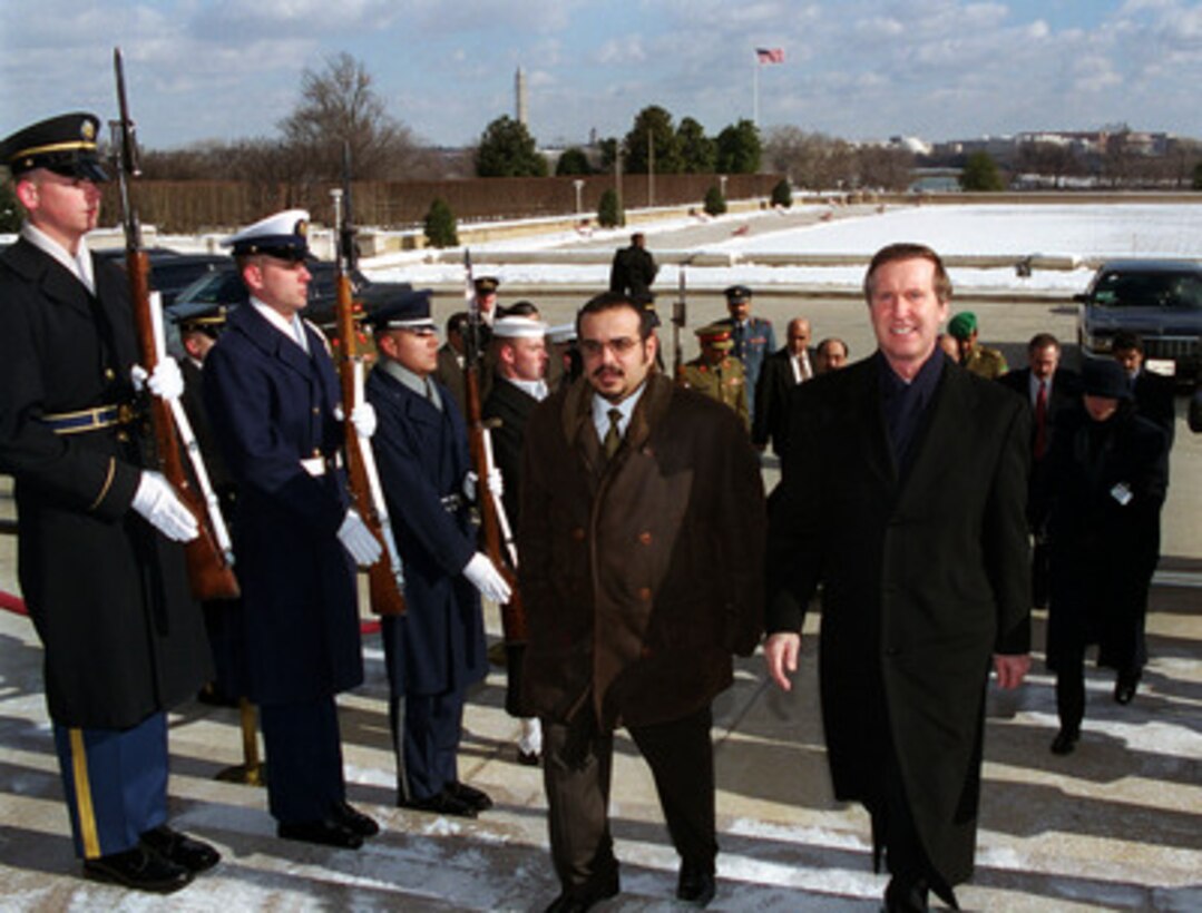 Secretary of Defense William S. Cohen (right) escorts Crown Prince Shaikh Salman bin Hamad Al-Khalifa, of Bahrain, into the Pentagon on Jan. 21, 2000. The crown prince, who also serves as the commander in chief of the defense forces of his nation, will meet with Cohen to discuss a range of bilateral and regional security issues. 
