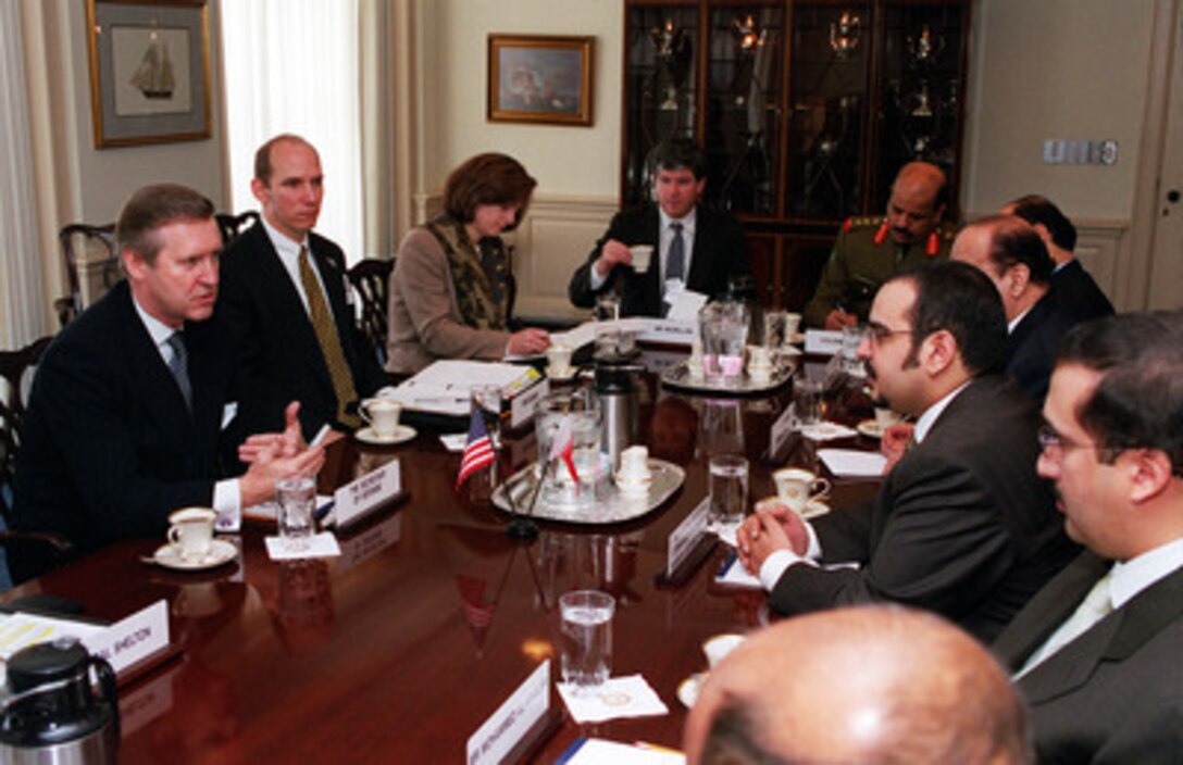 Secretary of Defense William S. Cohen (left) and his top policy advisors meet at the Pentagon with Crown Prince Shaikh Salman bin Hamad Al-Khalifa (center right) and his delegation on Jan. 21, 2000. The crown prince also serves as the commander in chief of the Bahrain defense forces. The two men are meeting to discuss a range of bilateral and regional security issues. 