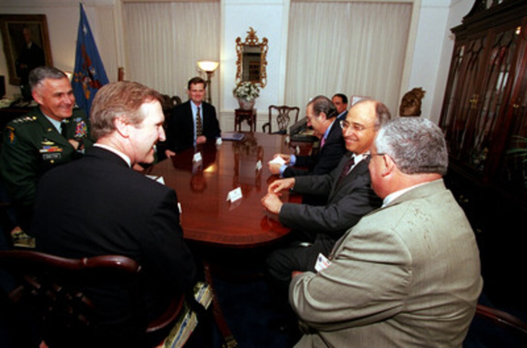 Secretary of Defense William S. Cohen (2nd from left) accompanied by Chairman of the Joint Chiefs of Staff Gen. Hugh H. Shelton (left), U.S. Army, meet with Brazilian Minister of Defense Geraldo Magela Quintao Alvares (2nd from right) and his staff in Cohen's Pentagon office on June 28, 2000. This is the first visit by the new position of Brazilian Minister of Defense. 