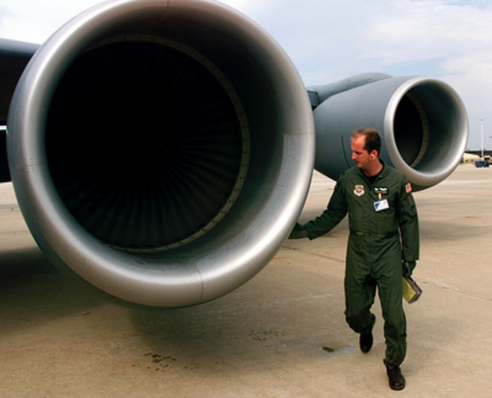 Capt. Dean Catalano completes his pre-flight of his KC-135R Stratotanker at Pope Air Force Base, N.C., on May 9, 2000, during Air Mobility Rodeo 2000. Rodeo 2000 is the U.S. Air Force Air Mobility Command's premier air mobility competition, involving more than 80 aircraft and 100 teams from 17 countries. The teams compete in airdrops, aerial refueling, aircraft navigation, special tactics, short field landings, cargo loading, engine running on and off load, aeromedical evacuations and security forces operations. Catalano is a Stratotanker pilot attached to the 92nd Air Refueling Wing, Fairchild Air Force Base, Wash. 