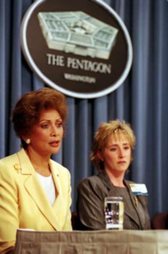 Janet Langhart Cohen (left) and Kelli Kirwan tell reporters at a Pentagon press conference about some of the most important topics dealt with during the Military Family Forum held in the Pentagon on May 31, 2000. One hundred military family members, selected from individual command areas or bases, were brought to the Pentagon to participate in the discussions devoted to military family issues. Cohen is the wife of Secretary of Defense William S. Cohen and Kerwin is the wife of a Marine Gunnery Sergeant stationed at Camp Pendleton, Calif. 