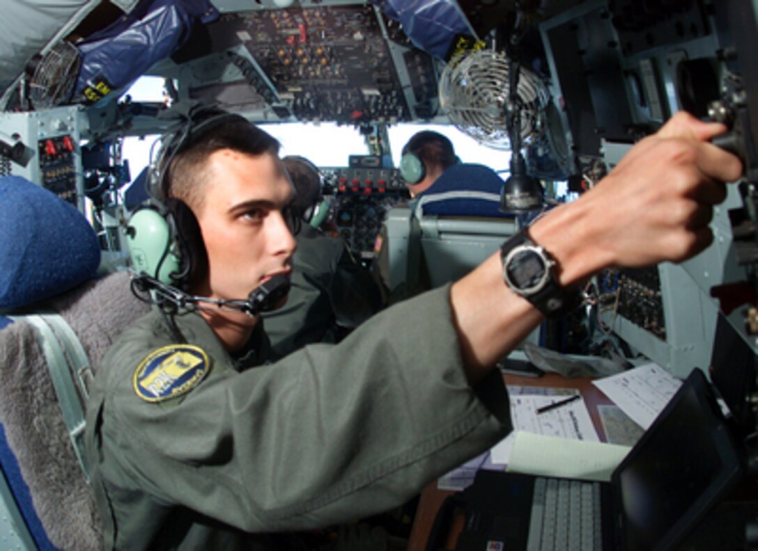 KC-135R Stratotanker Boom Operator Matt Galloway assists with the preparations to refuel a C-5 Galaxy during Air Mobility Rodeo 2000 on May 10, 2000. Rodeo 2000 is the U.S. Air Force Air Mobility Command's premier air mobility competition, involving more than 80 aircraft and 100 teams from 17 countries. The teams compete in airdrops, aerial refueling, aircraft navigation, special tactics, short field landings, cargo loading, engine running on and off load, aeromedical evacuations and security forces operations. Galloway is attached to the 22nd Air Refueling Wing, McConnell Air Force Base, Kan. 