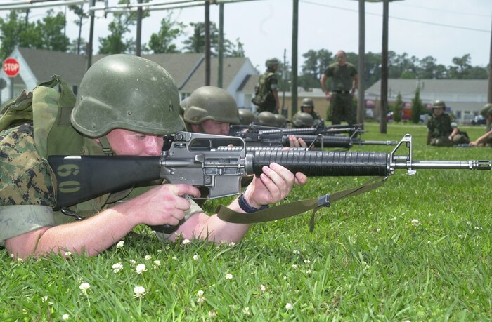 CAMP JOHNSON, N.C. - Petty Officer 3rd Class Chris S. Barnes, a corpsman going through the Field Medical Service School, dry fires his rifle while practicing safe firing procedures here June 6. The Field Medical School trains corpsman, dental technicians and religious program specialists to work with Marines in the fleet Marine force. (Official U.S. Marine Corps photo by Lance Cpl. Brandon R. Holgersen)