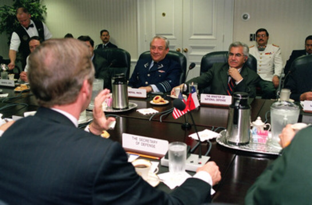 Secretary of Defense William S. Cohen (left foreground) meets with visiting Chilean Minister of Defense Mario Fernandez (right) at the Pentagon on June 2, 2000. The two defense leaders are meeting to discuss a broad range of global as well as regional defense issues of interest to both nations. Accompanying Minister Fernandez is Lt. Gen. Patricio Rios Ponce (seated to the left of Fernandez), the commander in chief of the Chilean Air Force. 