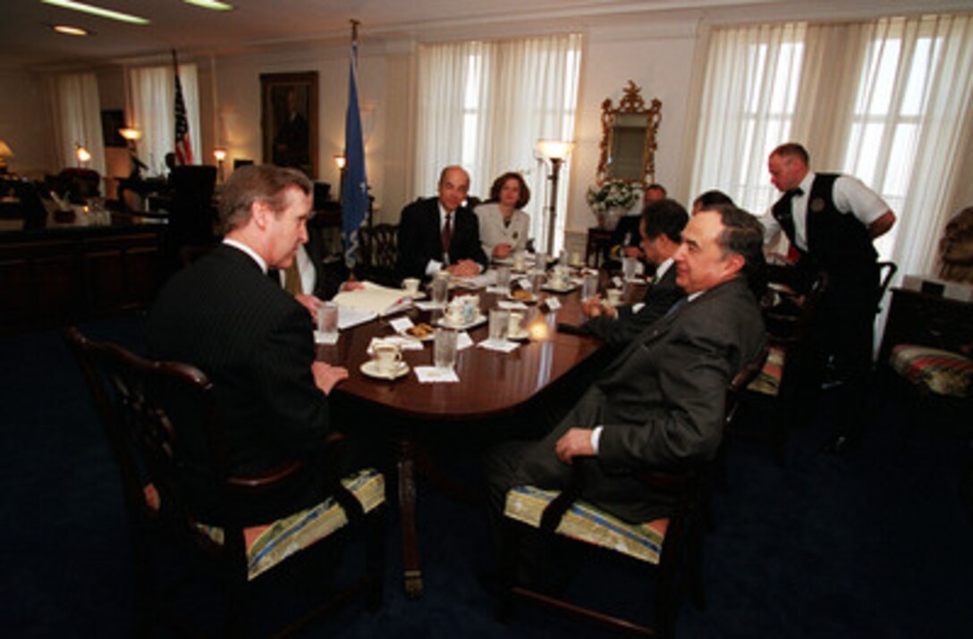 Secretary of Defense William S. Cohen (left) meets with Minister of Foreign Affairs Habib Ben Yahia (right), of the Republic of Tunisia, in his Pentagon office on Feb. 25, 2000. The two men and their senior advisors are meeting to discuss a range of regional security issues of interest to both nations. 
