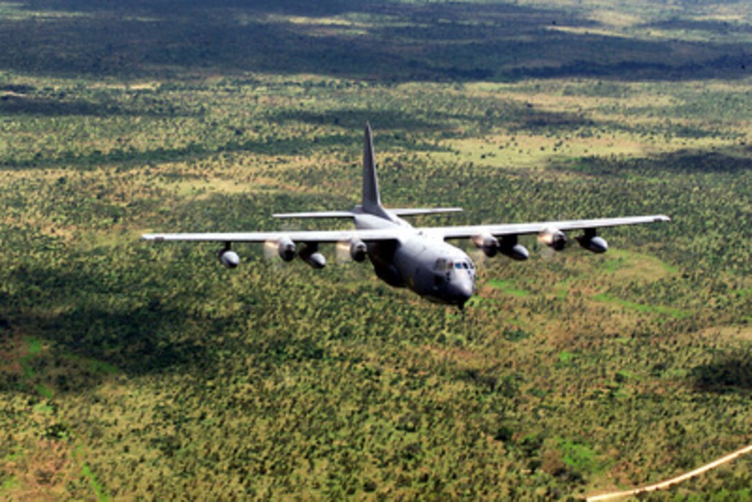 A U.S. Air Force MC-130P Combat Shadow flies over South Africa on March 20, 2000, en route to a reconnaissance mission of damaged roads in Central Mozambique during Operation Atlas Response. Operation Atlas Response is the U.S. military's contribution to relief efforts following torrential rains and flooding in southern Mozambique and South Africa. The Combat Shadow is deployed for the operation from the 67th Special Operations Squadron, RAF Mildenhall, England. 