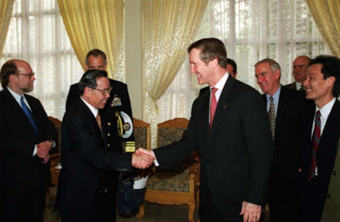 Vietnamese Prime Minister Phan Van Khai meets in his Hanoi office with Secretary of Defense William S. Cohen on March 13, 2000. Cohen is the first U.S. defense secretary to visit Vietnam since the end of the Vietnam War in 1975. From left to right: Ralph Boyce, Department of State; Khai; Cohen; U.S. Ambassador to Vietnam Douglas "Pete" Peterson; Robert Jones, Deputy Assistant Secretary of Defense (POW/Missing Personnel); interpreter. 