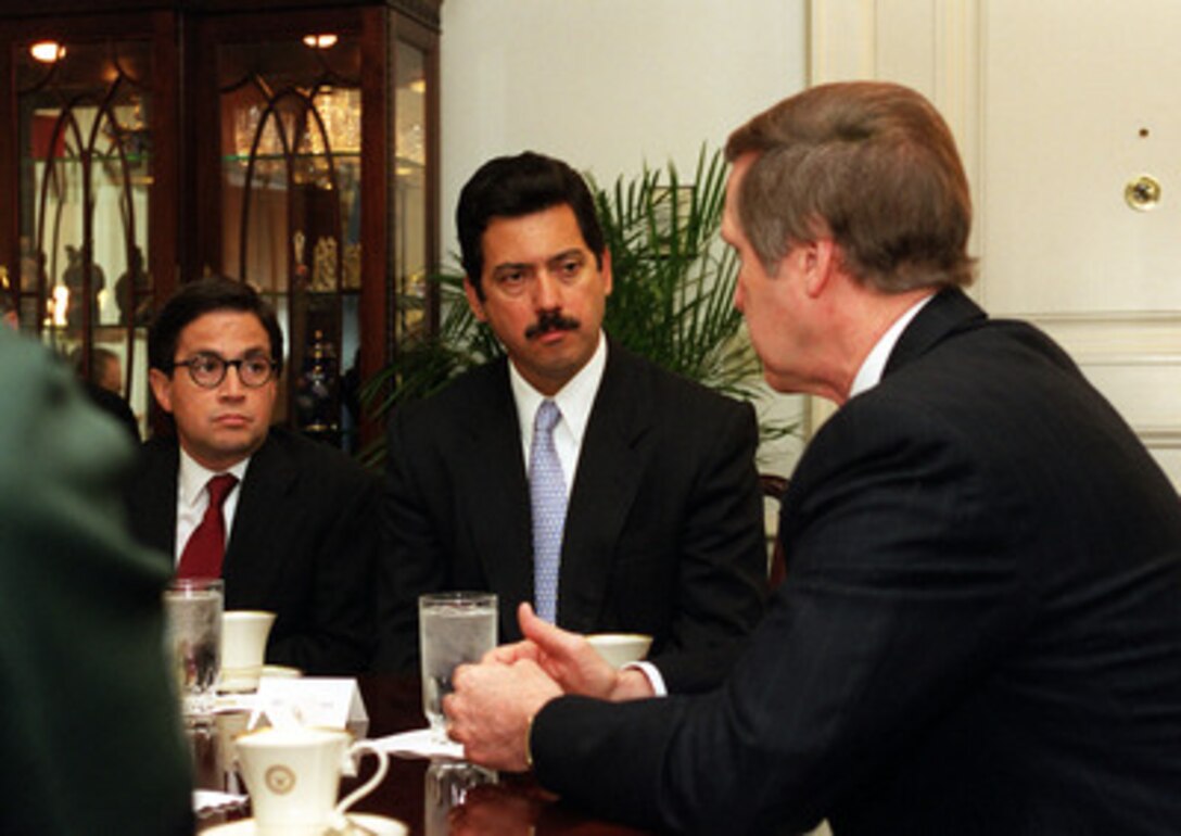 Secretary of Defense William S. Cohen (right) meets in his Pentagon office with Minister of National Defense Luis Fernando Ramirez (center), and Ambassador Luiz Alberto Moreno (left), both of the Republic of Colombia, on April 27, 2000. Ramirez and Moreno are meeting with Cohen to discuss a broad range of security issues of interest to both nations. 