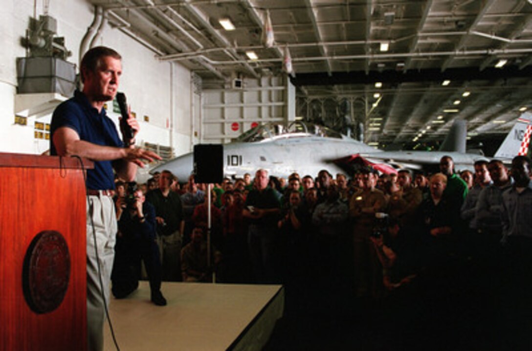 Secretary of Defense William S. Cohen addresses the crew of the aircraft carrier USS John C. Stennis (CVN-74) in the hangar deck as the ship operates in the Persian Gulf on April 7, 2000. Cohen is in the Persian Gulf region to meet with U.S. troops stationed there and defense leaders of the Gulf region. Stennis and its embarked Carrier Air Wing 9 are on station in the Gulf in support of Operation Southern Watch. 