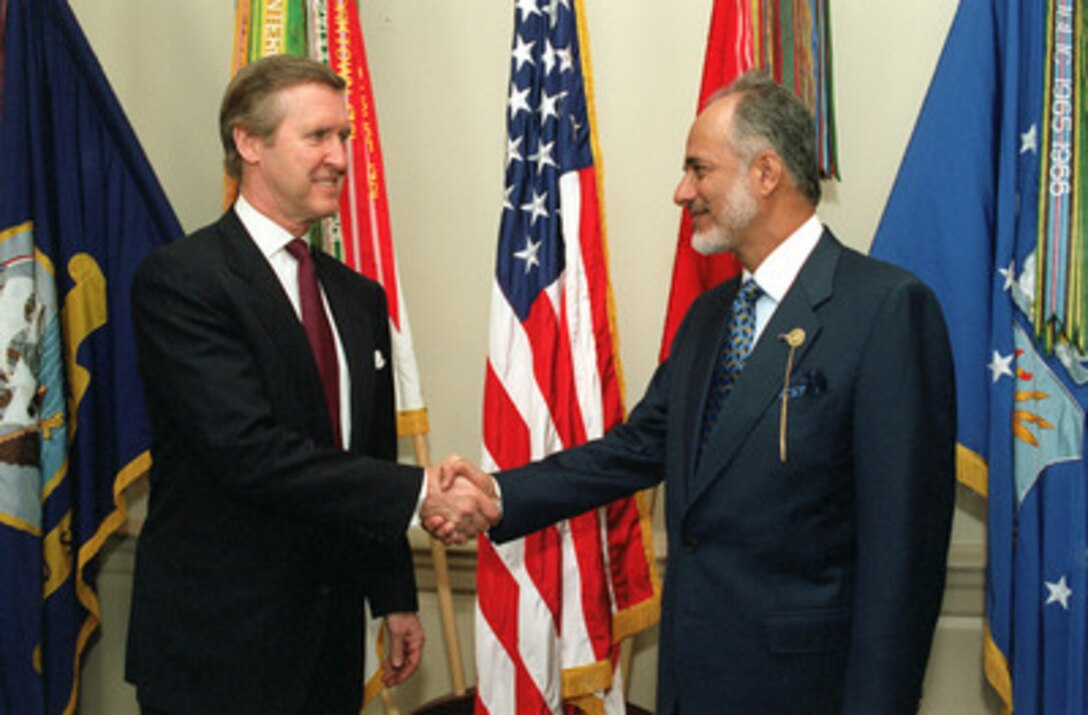Secretary of Defense William S. Cohen (left) welcomes Minister Responsible for Foreign Affairs Yusuf bin Alawi bin Abdallah (right), of the Sultanate of Oman, to his Pentagon office on May 4, 2000. The two men will meet to discuss a range of security issues of interest to both nations. 